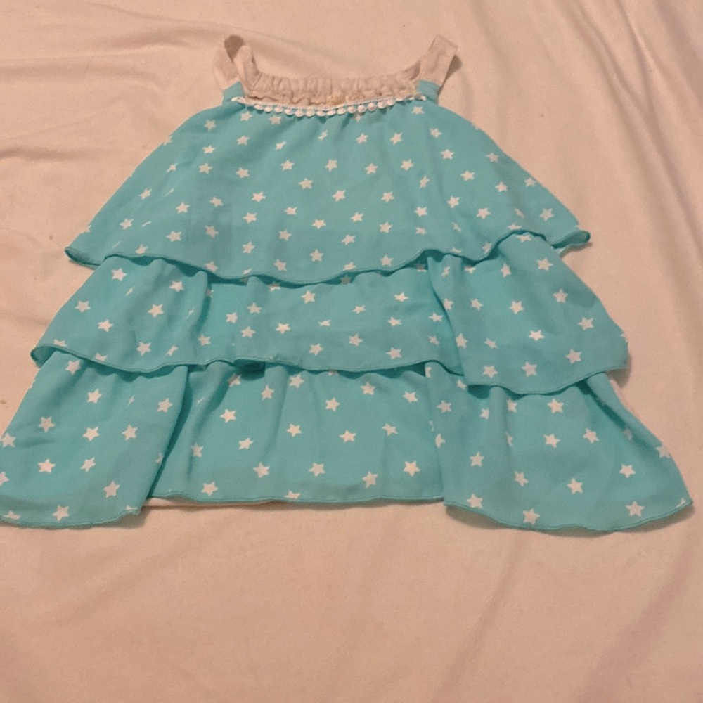 kids tank top, blue with white stars and white back. put your best offer.